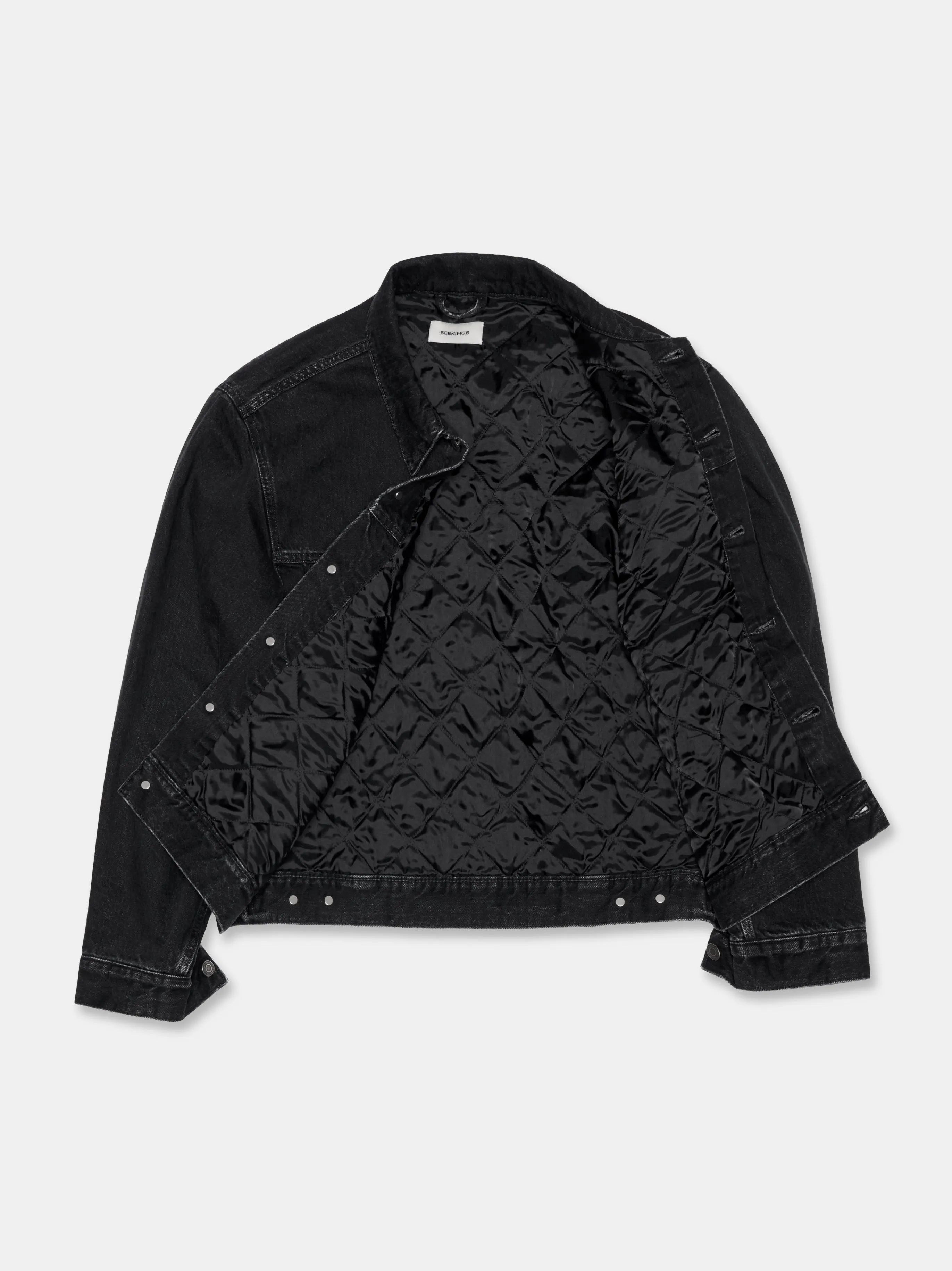 QUILTED DENIM LINER JACKET IN BLACK ACID RINSE
